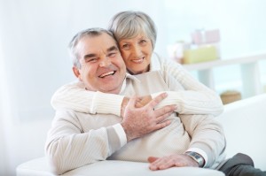 senior-couple-hugging-at-home_1098-1297