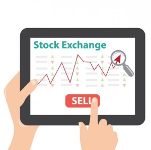 tablet-with-stock-exchange-graphic-on-screen_1034-48